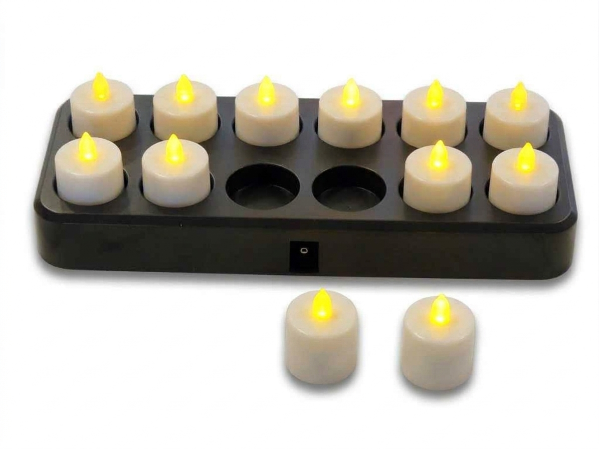 LED rechargeable candles with a black recharging base on a white background
