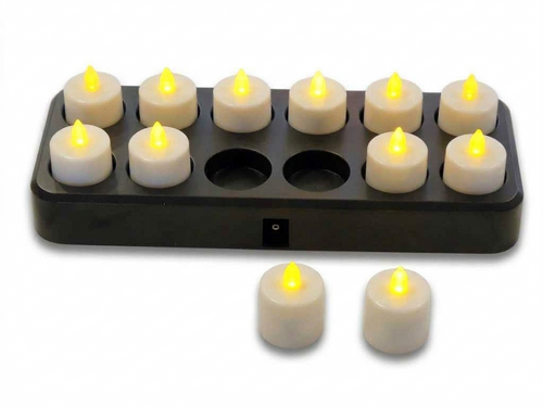 LED rechargeable candles with a black recharging base on a white background