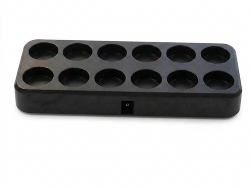 Charging base for True Flicker rechargeable tea lights on white background